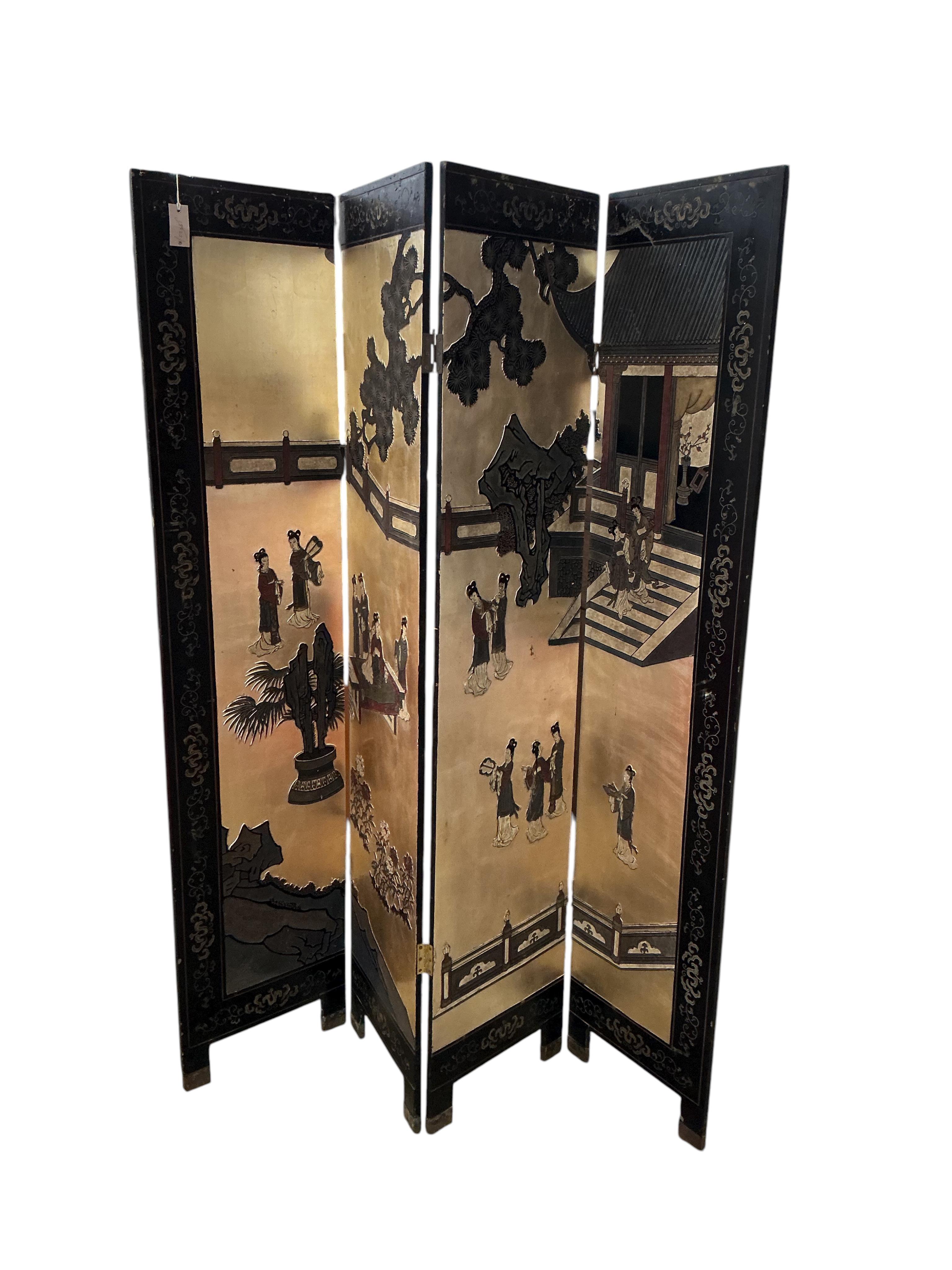 A late 19th century Chinese black lacquer four fold draught screen, each panel width 41cm, height 183cm